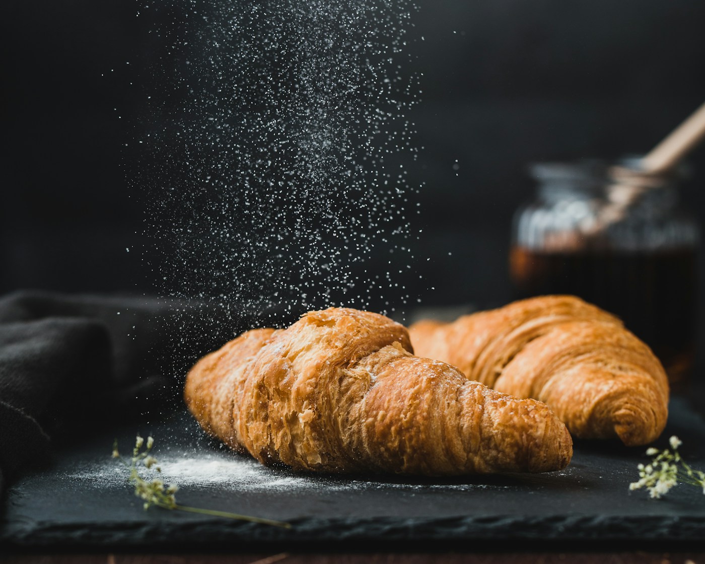 Golden handmade croissants and pastries at the bakery